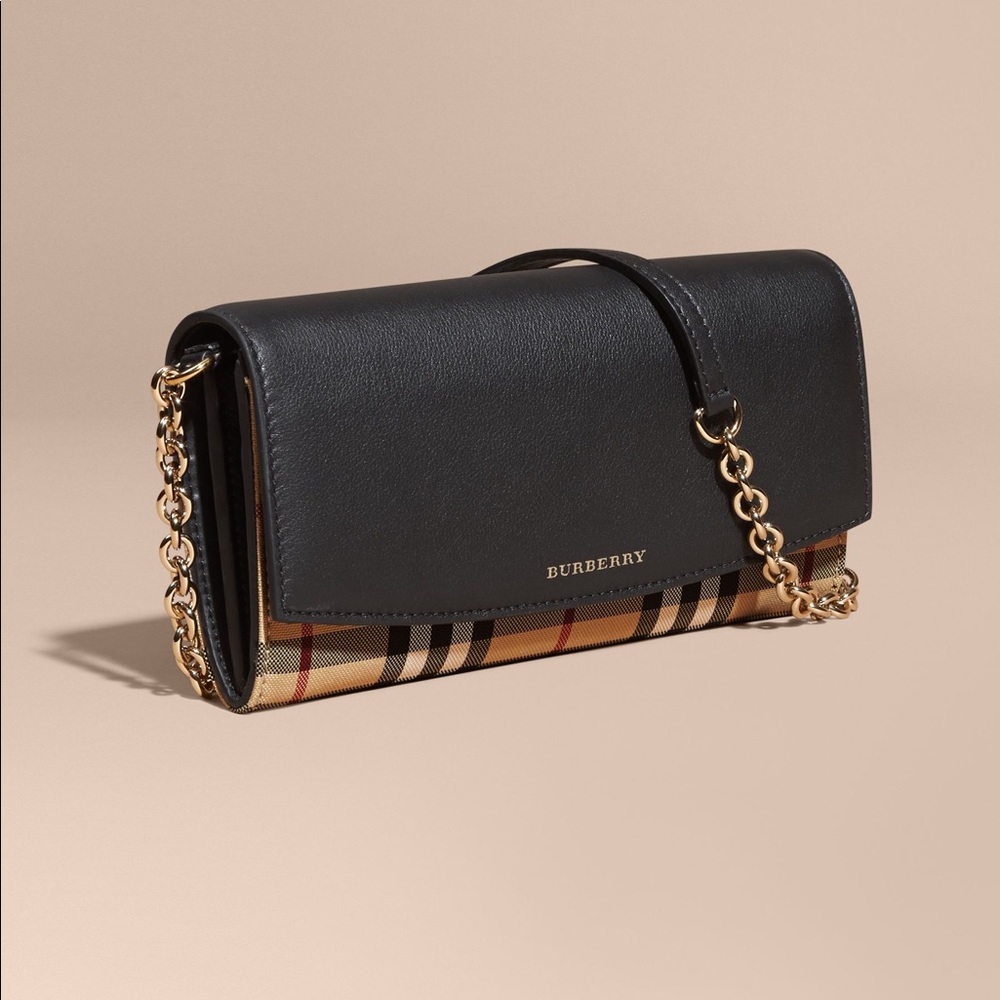 Burberry wallet on a chain.